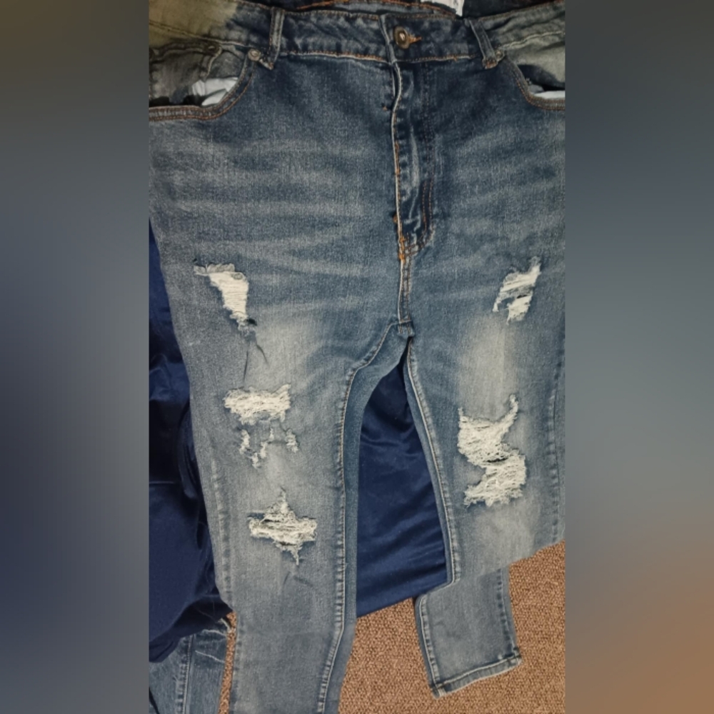 Distressed Blue Denim Jeans